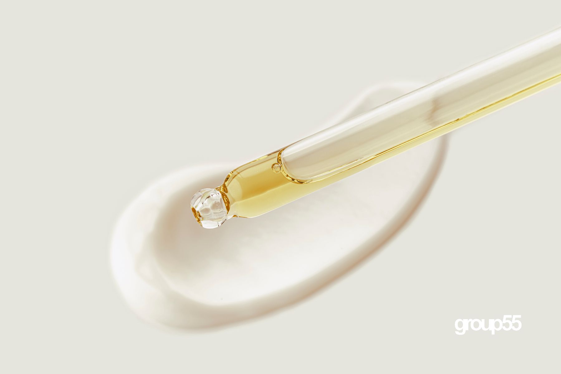 the vital role of preservatives in formulations. image of a cream and oil in pipette